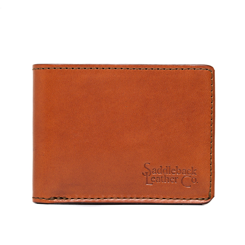 Closed tan leather bifold wallet, wider than it is tall, with a logo embossed in the lower corner.
