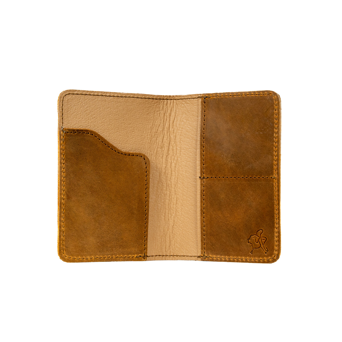 Slim Passport Wallet in Tobacco opened flat to show the passport sleeve, card pockets and tan interior
