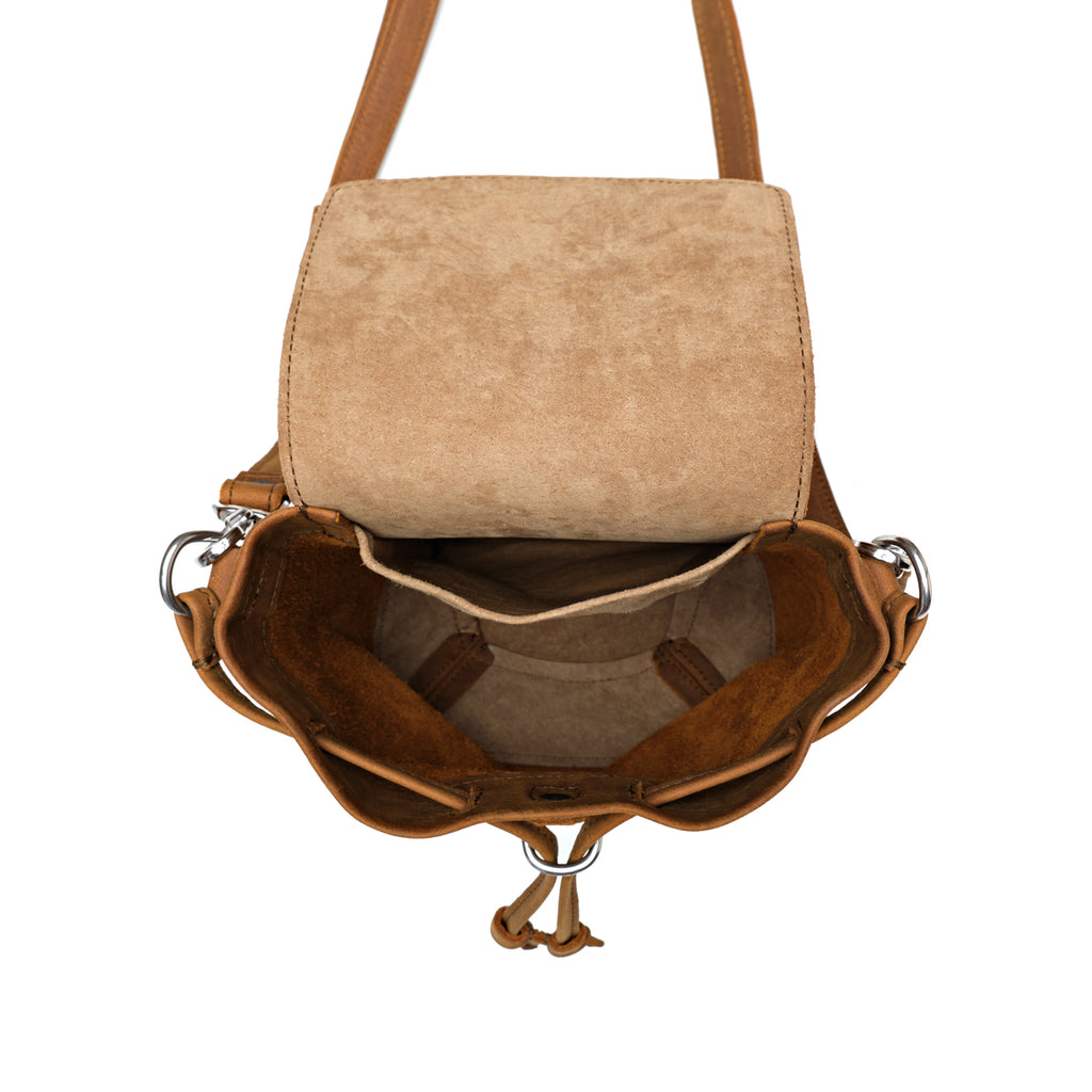 Mini Bucket Bag in Tobacco, top view open and empty showing suede lining and interior pockets