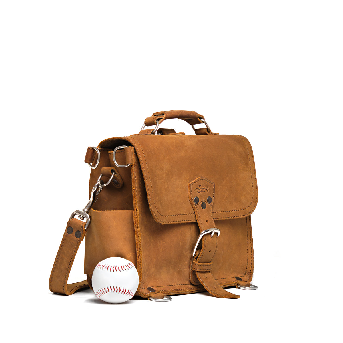 Slim Leather Briefcase in Tobacco, angled side view beside a baseball for size comparison
