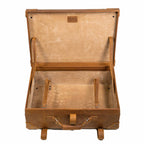 Grandfather Medium Suitcase in Tobacco, opened to show the canvas lining and leather tie-down straps