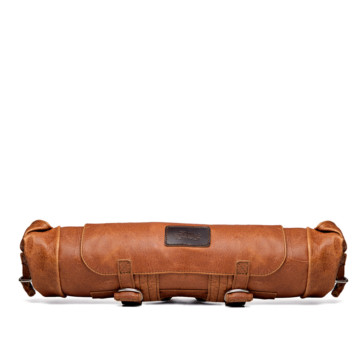 Large Travel Backpack in Bacon, rolled up flat for storage, side view