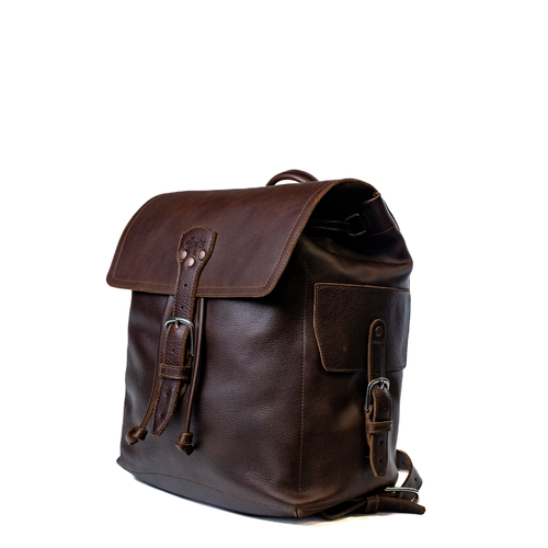 16" Drawstring Backpack in Dark Coffee Brown, angled front view with buckled flap and side pocket