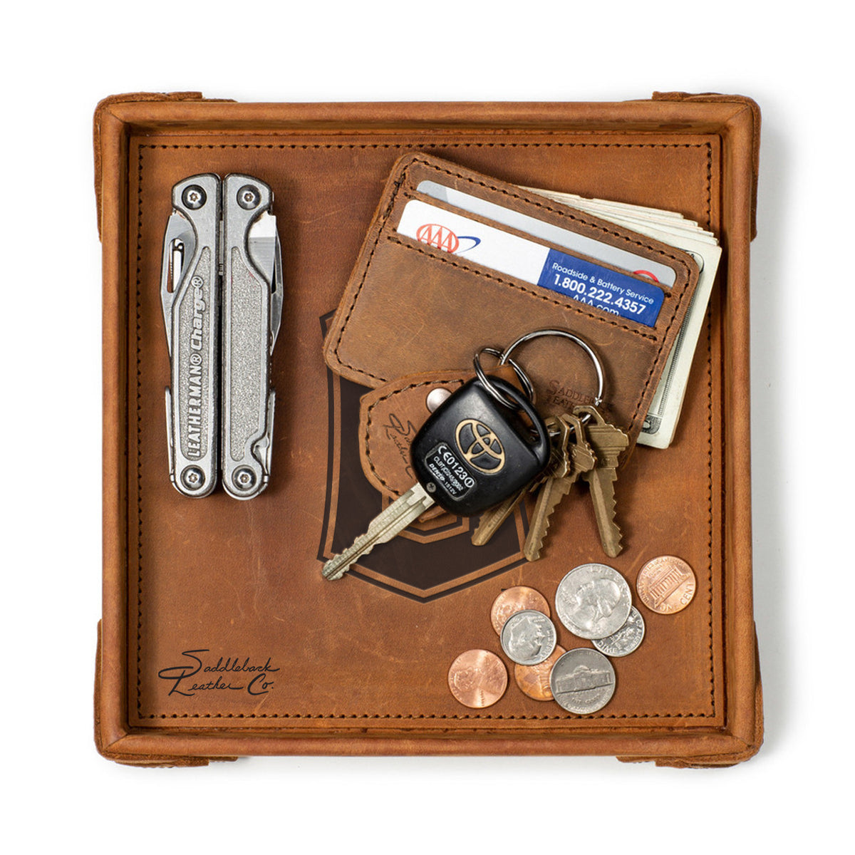 Cleveland Guardians Leather Valet Tray in Tobacco, top-down view holding a multi-tool, card wallet, keys and coins